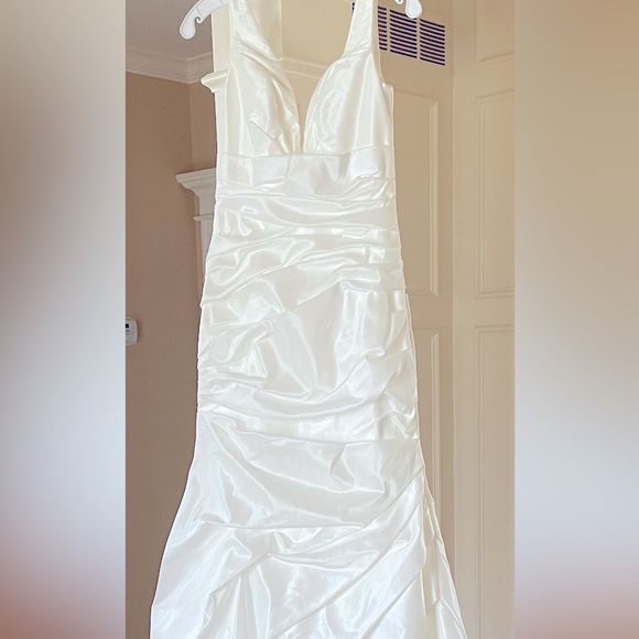 Dresses & Skirts - Wedding dress never tried on or worn. Flattering on anyone!